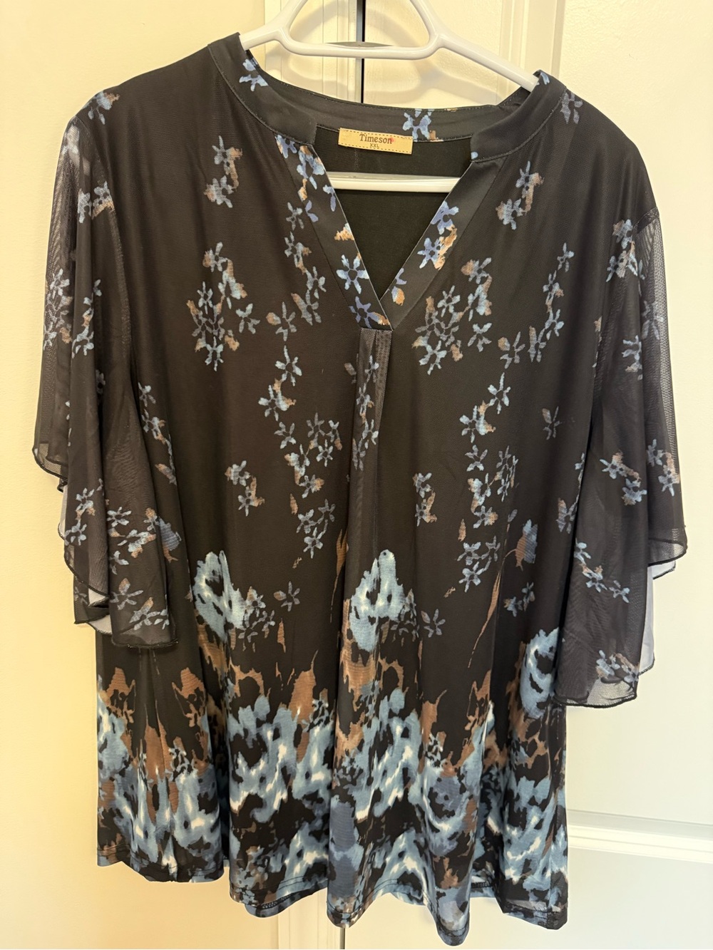 Timeless Black Floral V-Neck Mesh Tunic with Blue Accents